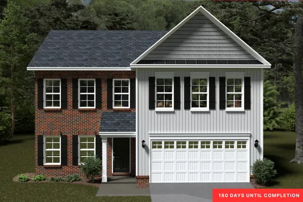 a view of a large brick house with large windows