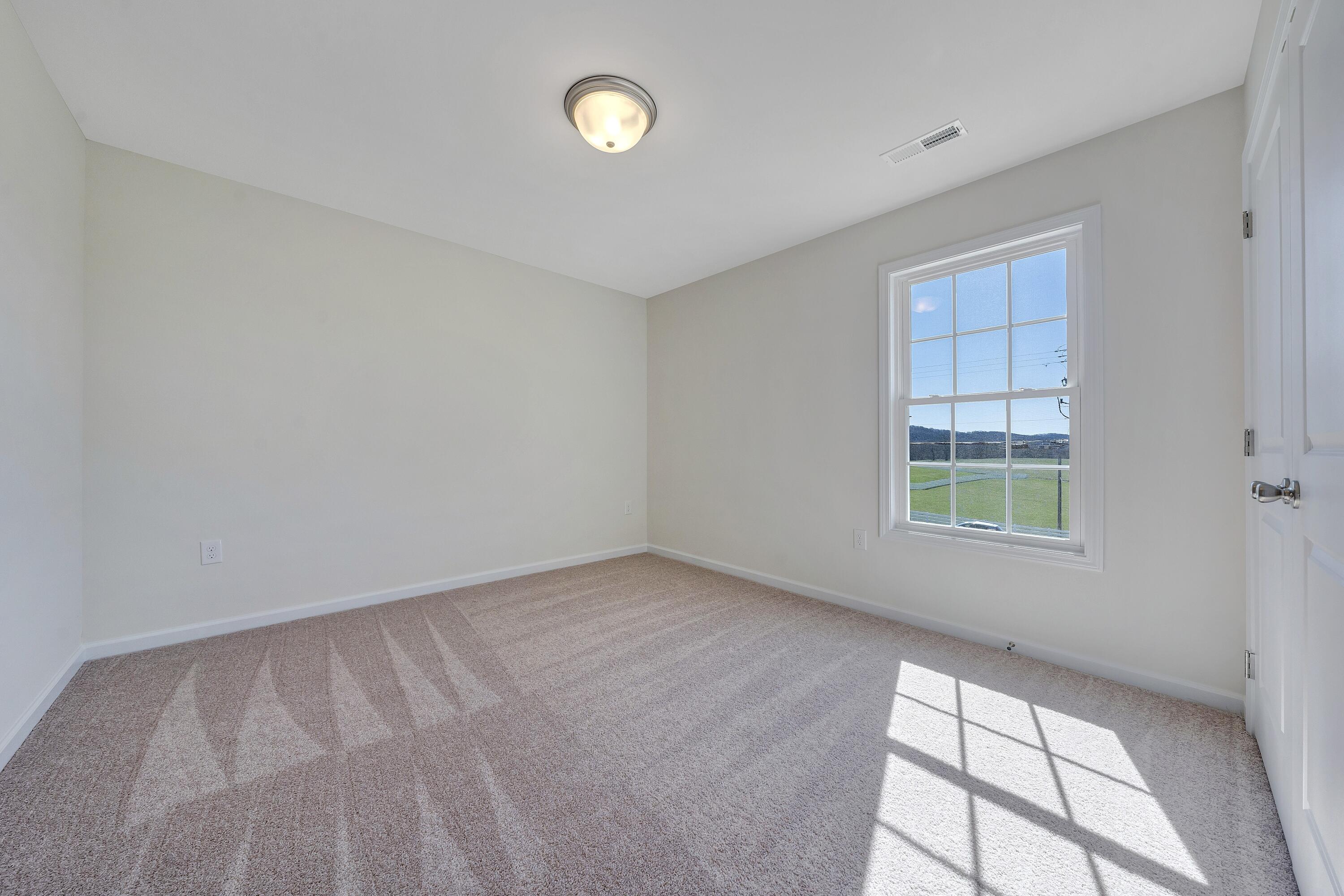 3076 Isabel Lane Salem, VA 24153 - Photo 13 of 16 an empty room with a window