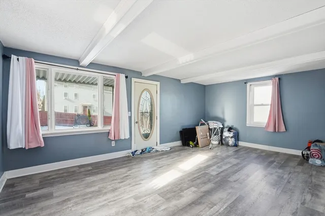 a view of livingroom with furniture and window