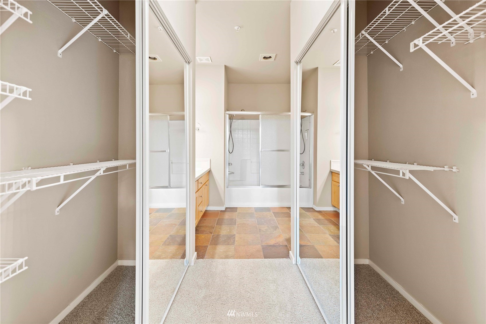 2009 196th Street Southeast, Unit D201 Bothell, WA 98012 - Photo 16 of 30 a bathroom with a tub and shower