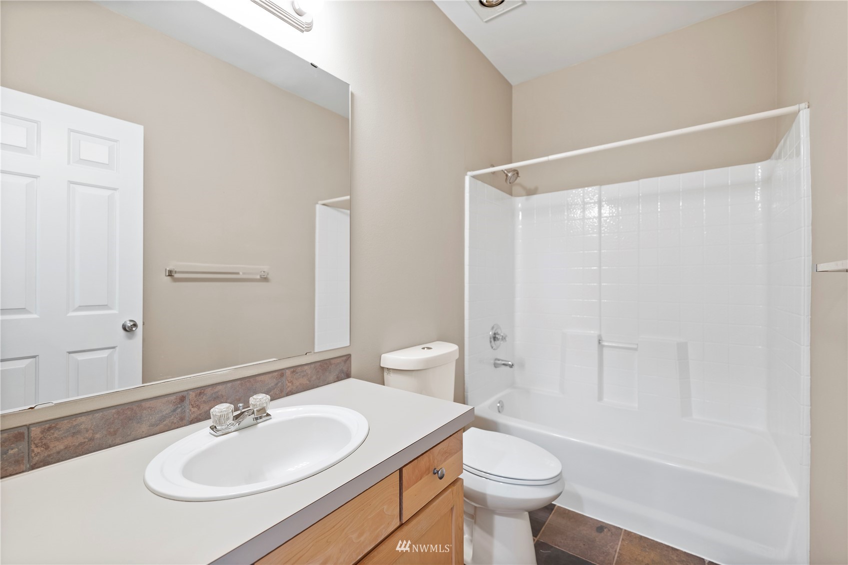 2009 196th Street Southeast, Unit D201 Bothell, WA 98012 - Photo 20 of 30 a bathroom with a sink a toilet and shower