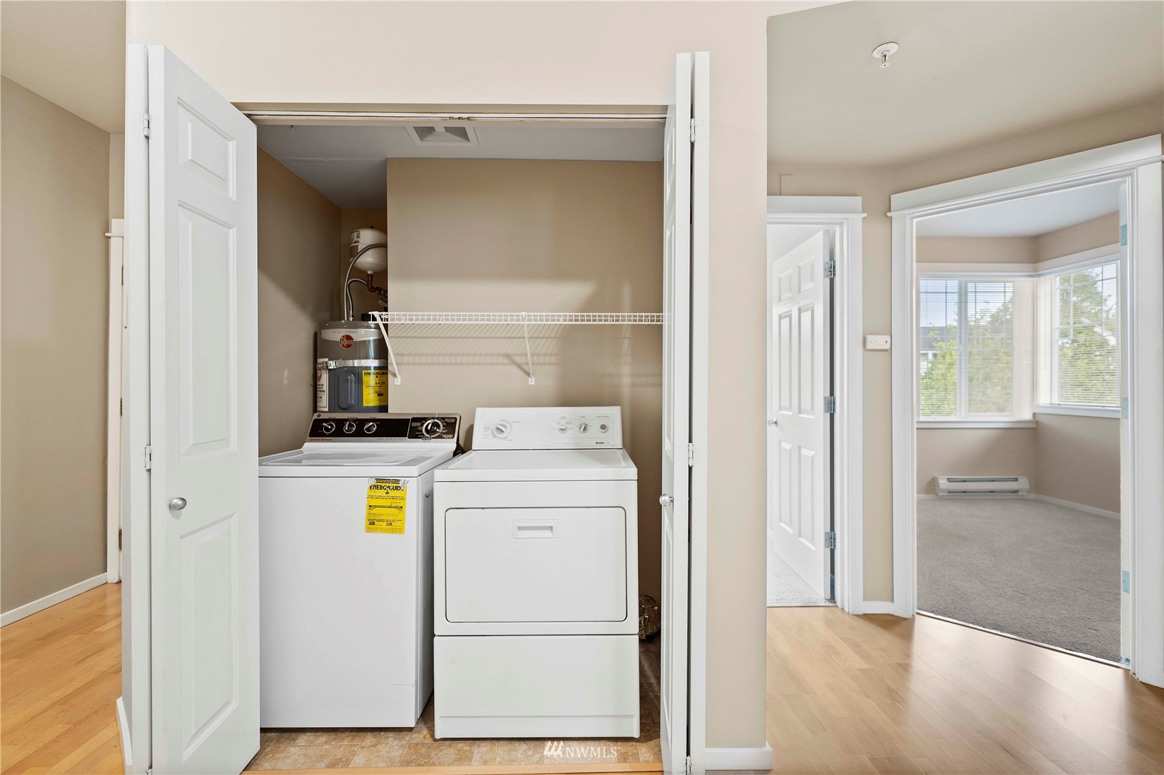 2009 196th Street Southeast, Unit D201 Bothell, WA 98012 - Photo 21 of 30 a utility room with dryer and washer