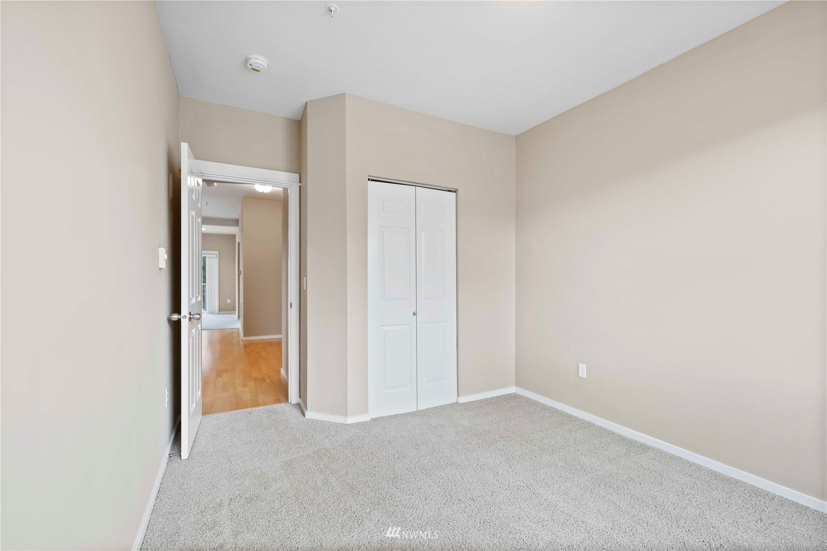 2009 196th Street Southeast, Unit D201 Bothell, WA 98012 - Photo 23 of 30 an empty room with a bathroom and a sink