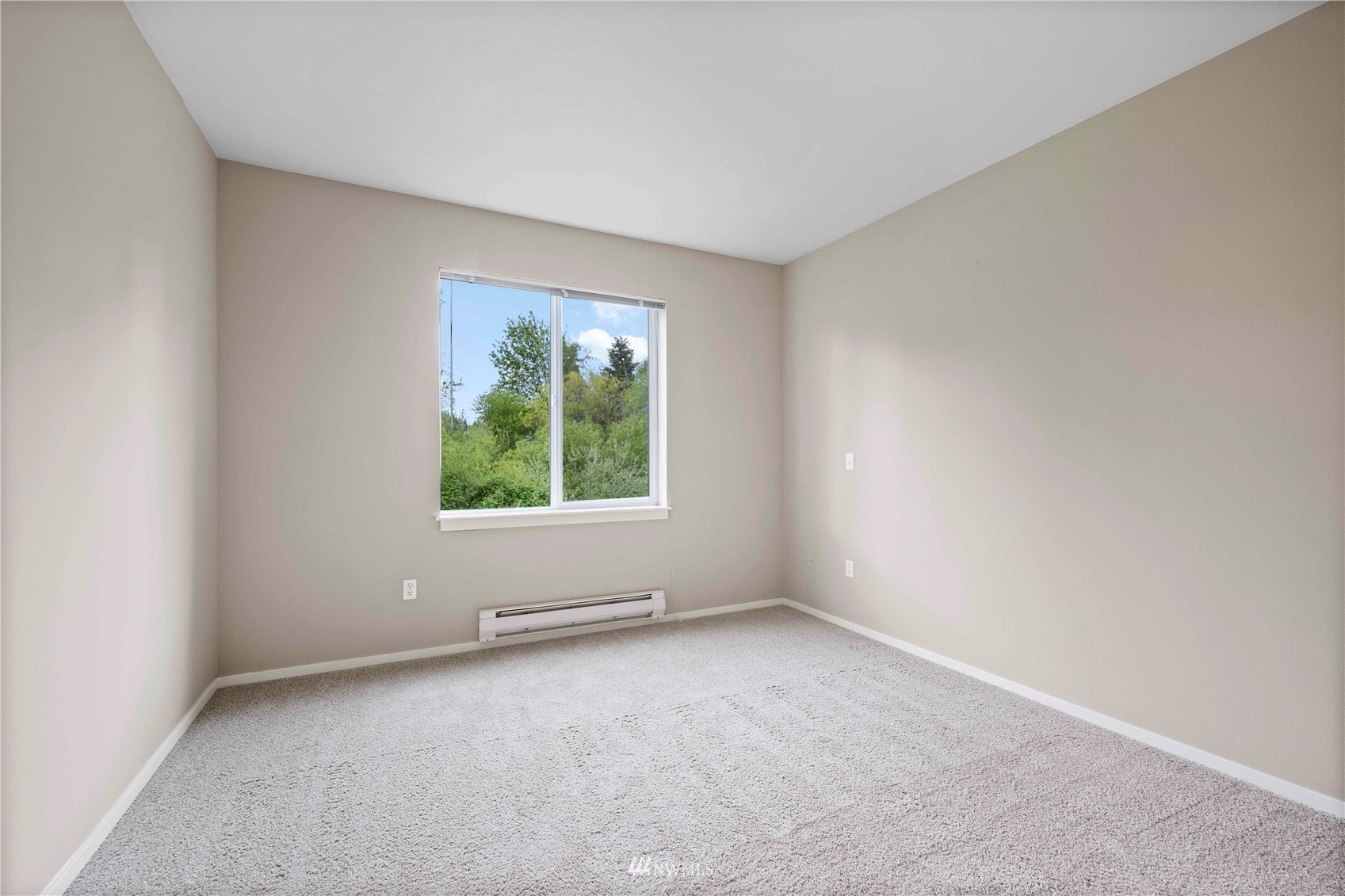 2009 196th Street Southeast, Unit D201 Bothell, WA 98012 - Photo 10 of 30 a view of an empty room with a window