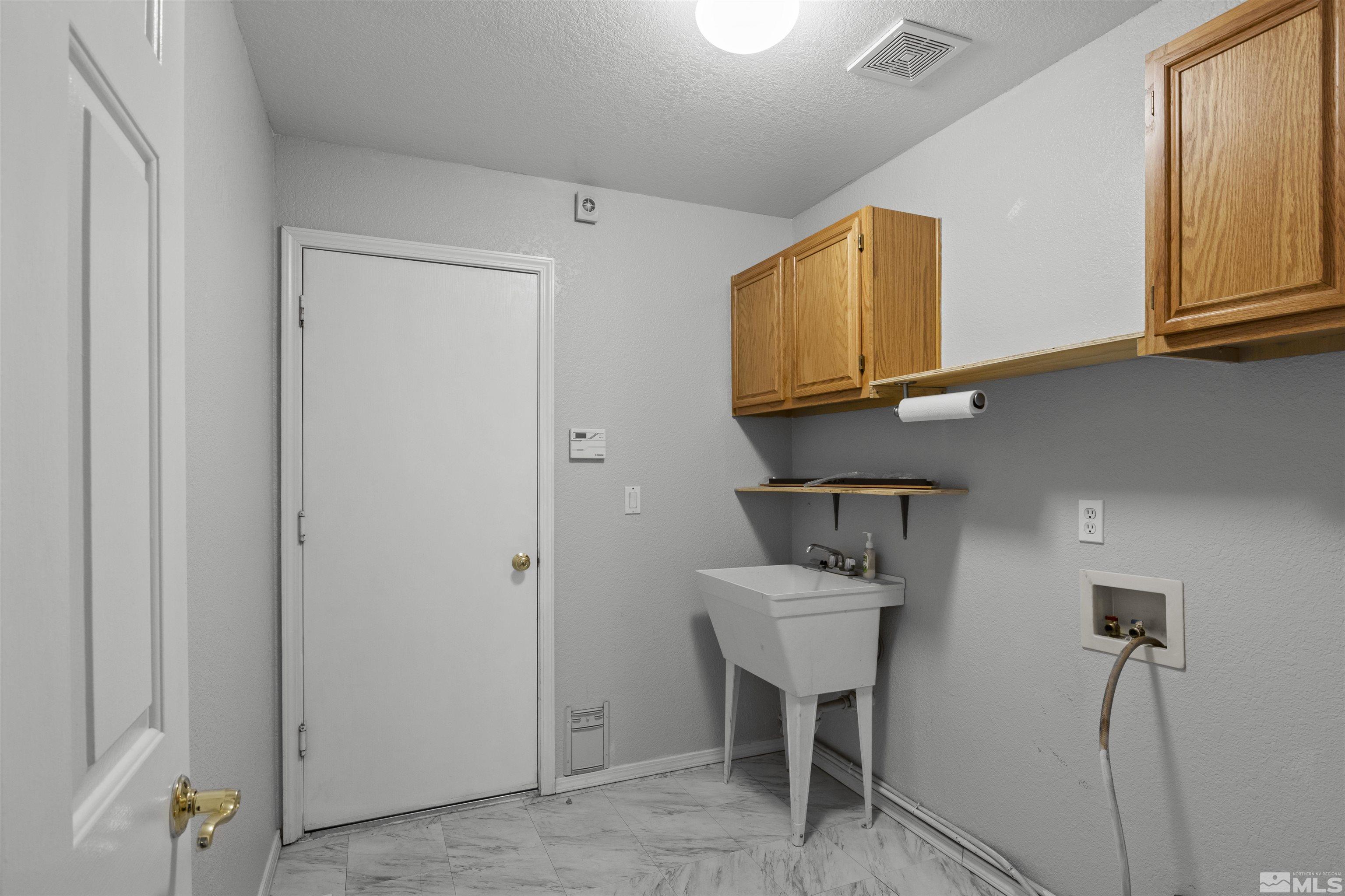 1990 Honey Ridge Drive Reno, NV 89511 - Photo 11 of 24 a room with table and chair