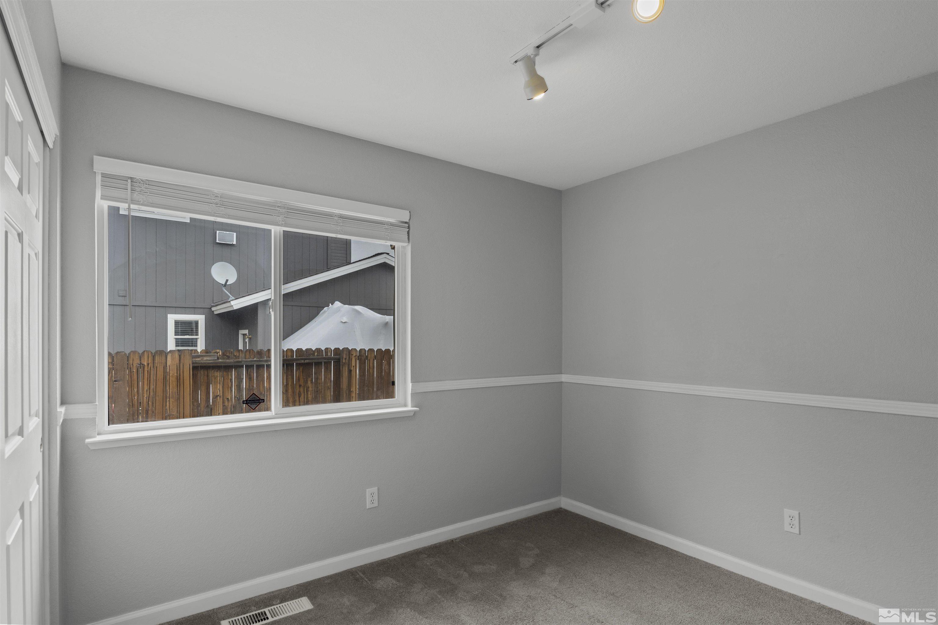 1990 Honey Ridge Drive Reno, NV 89511 - Photo 12 of 24 a room that has a window in it