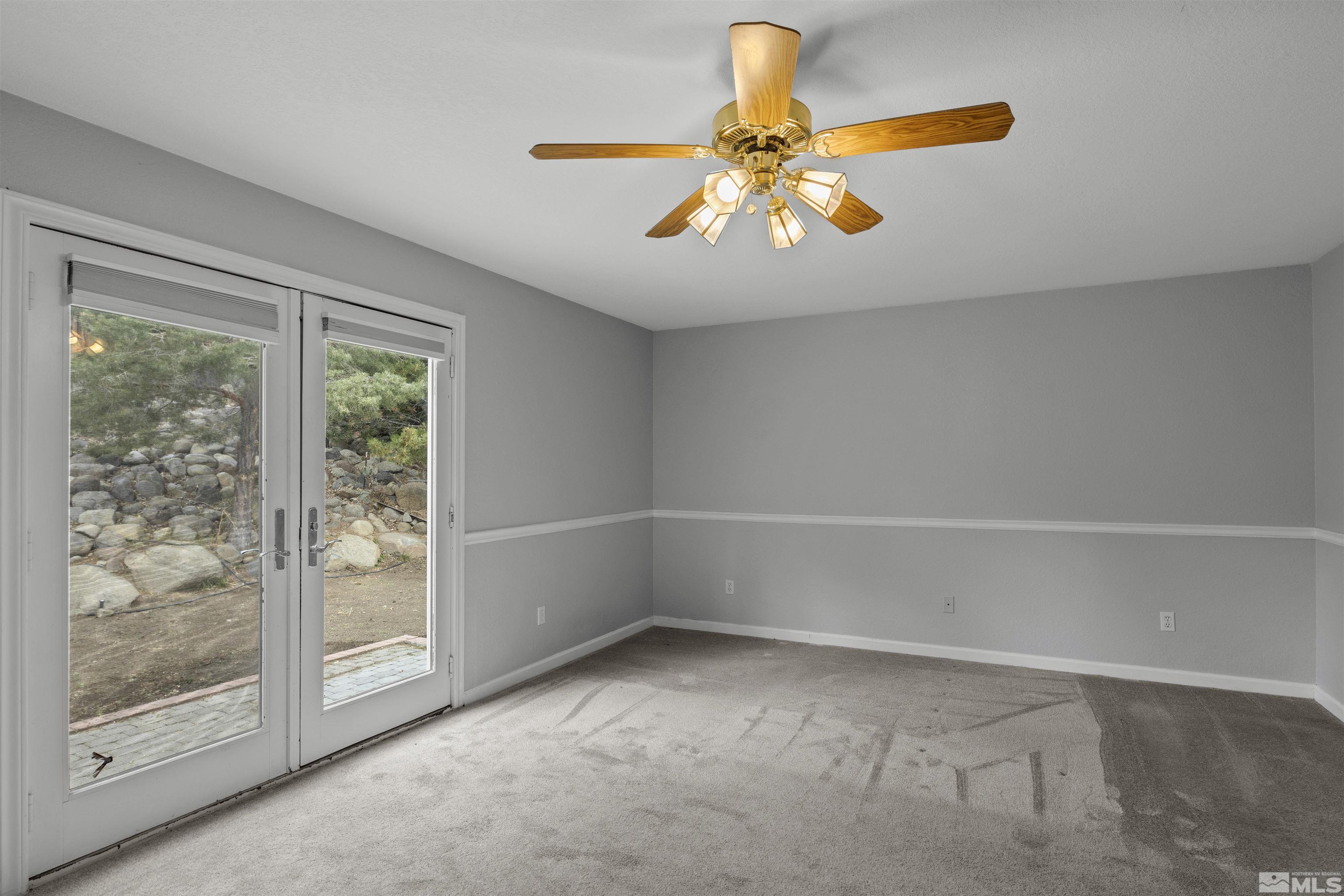1990 Honey Ridge Drive Reno, NV 89511 - Photo 15 of 24 a view of an empty room with a window