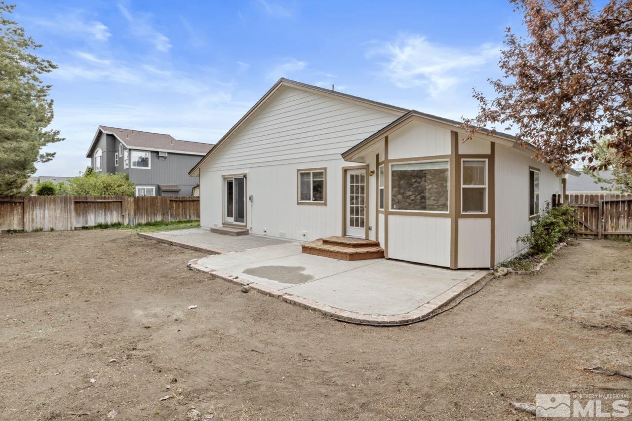 1990 Honey Ridge Drive Reno, NV 89511 - Photo 22 of 24 a view of a house with backyard