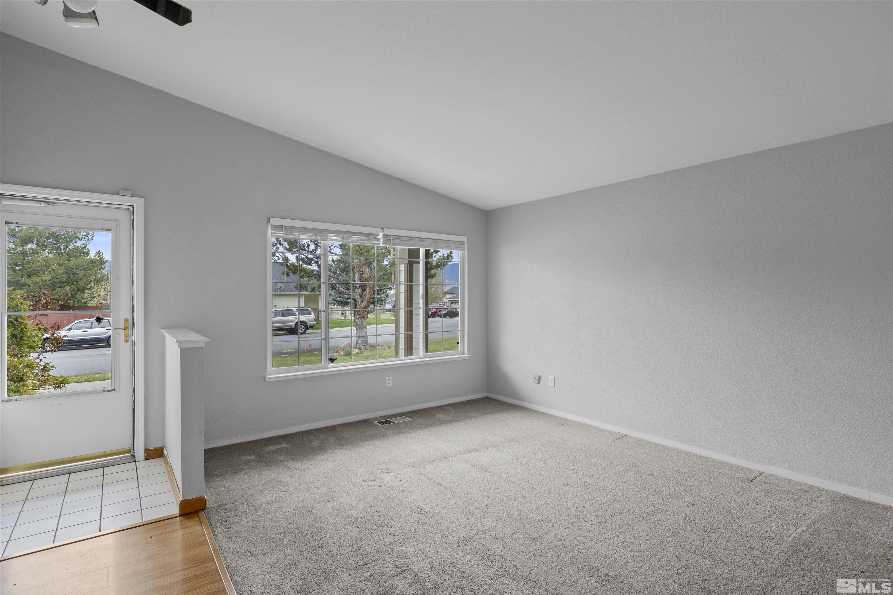 1990 Honey Ridge Drive Reno, NV 89511 - Photo 4 of 24 an empty room with windows