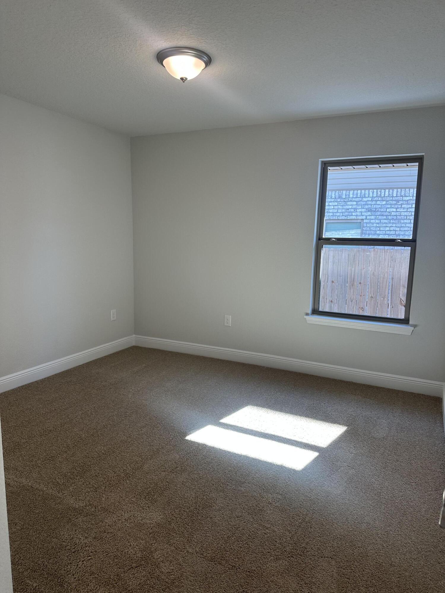 329 Keswick Lane Crestview, FL 32536 - Photo 14 of 22 an empty room with a window