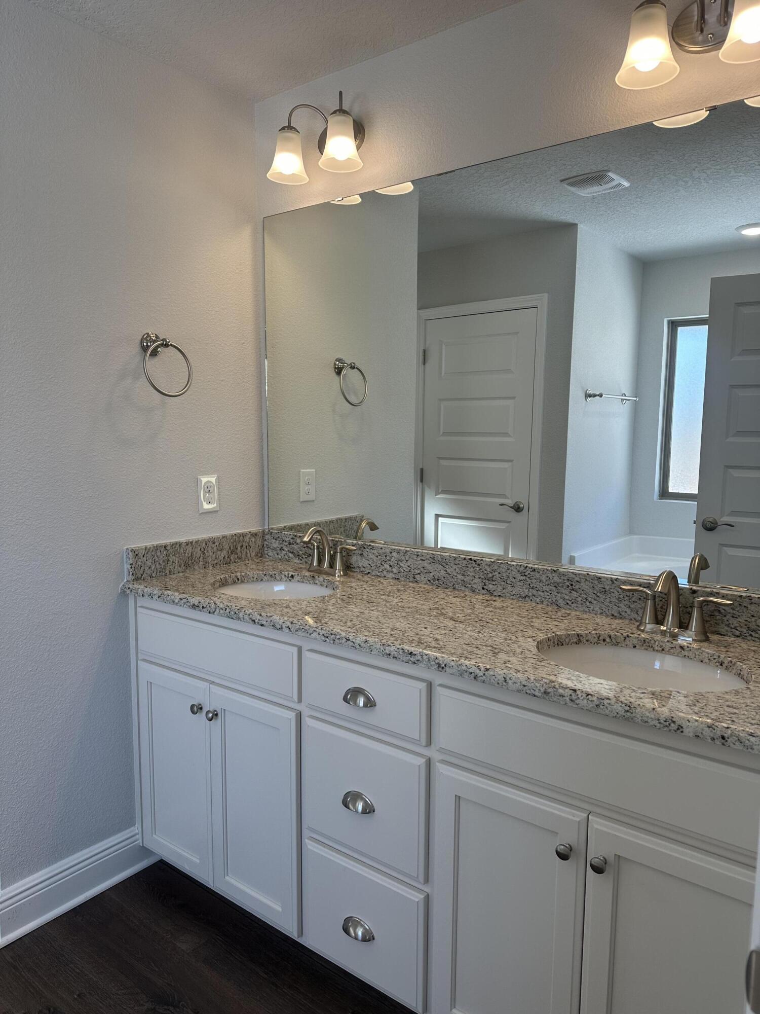 329 Keswick Lane Crestview, FL 32536 - Photo 18 of 22 a bathroom with a granite countertop sink double and mirror