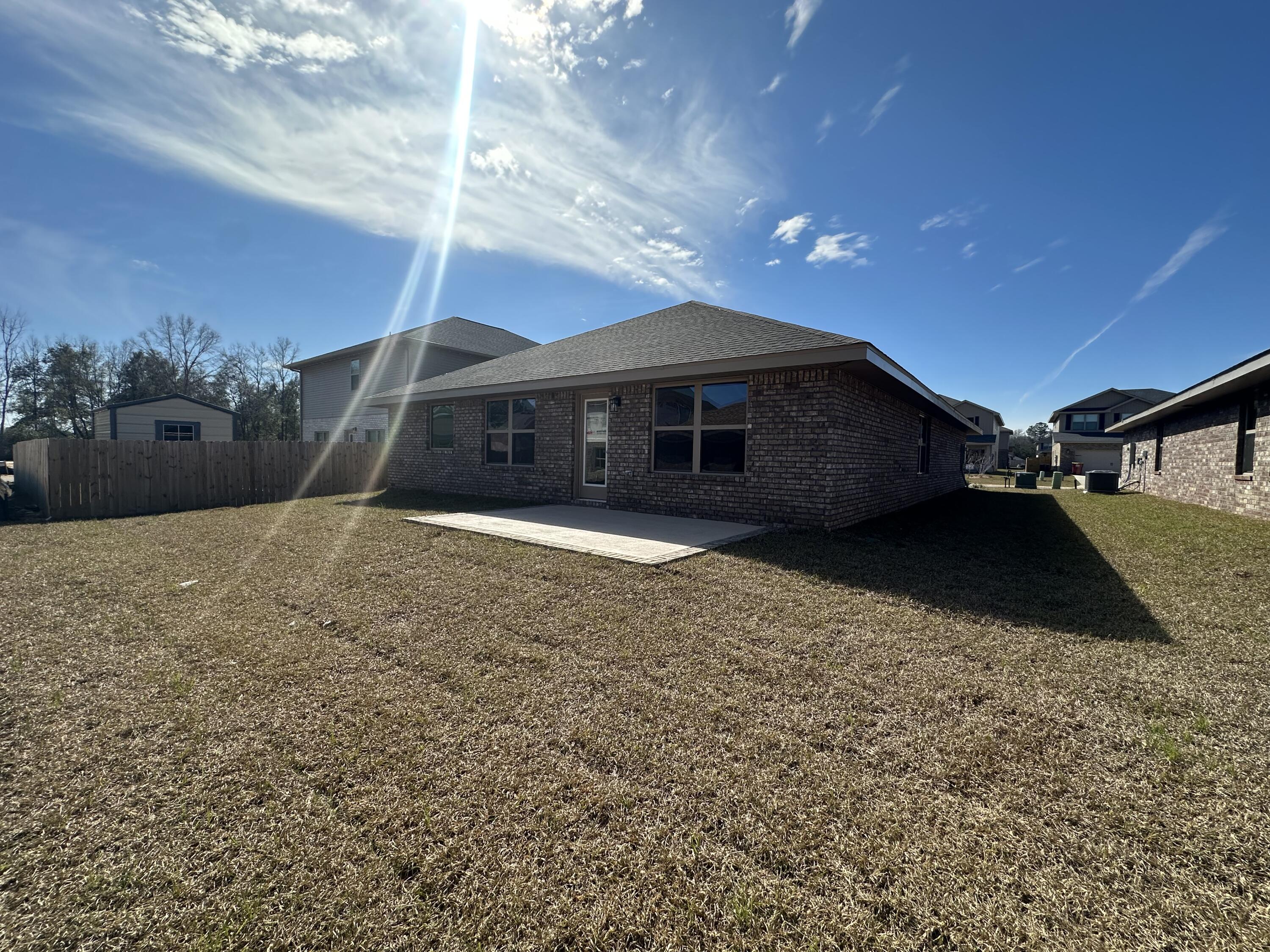 329 Keswick Lane Crestview, FL 32536 - Photo 21 of 22 a view of a house with a yard