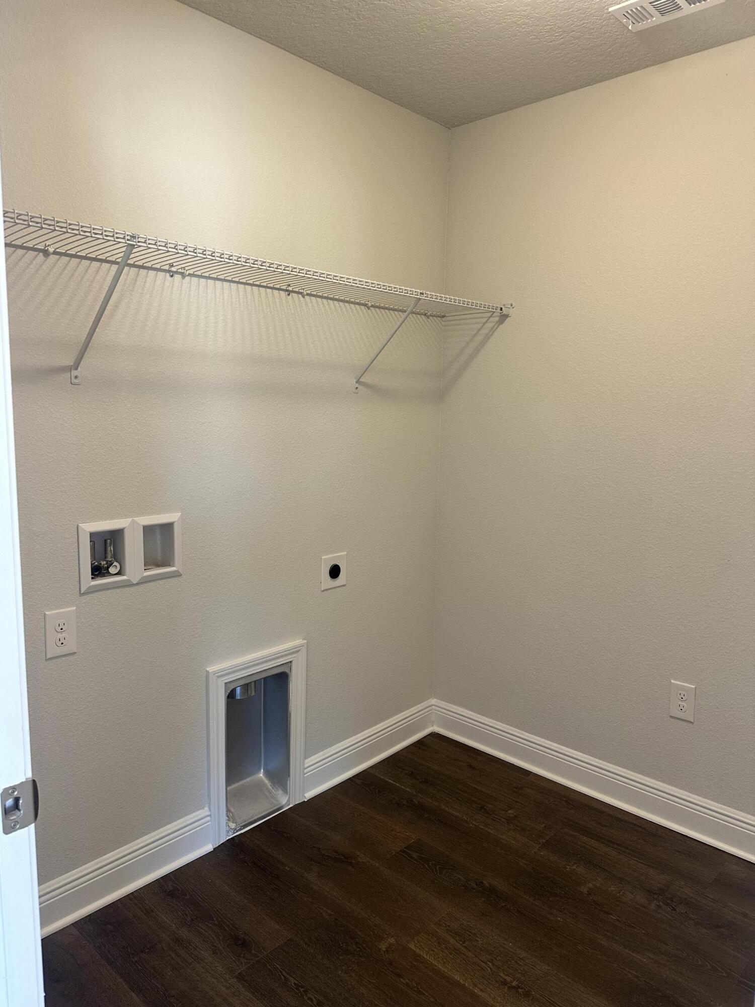 329 Keswick Lane Crestview, FL 32536 - Photo 6 of 22 a view of a room with wooden floor