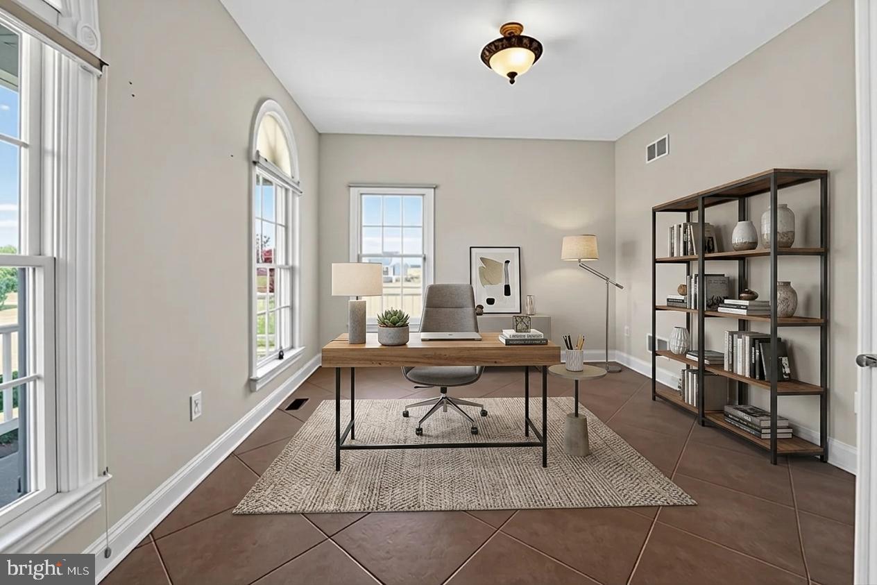 1165 Line Road Westminster, MD 21158 - Photo 20 of 75 a view of a workspace with furniture and a window