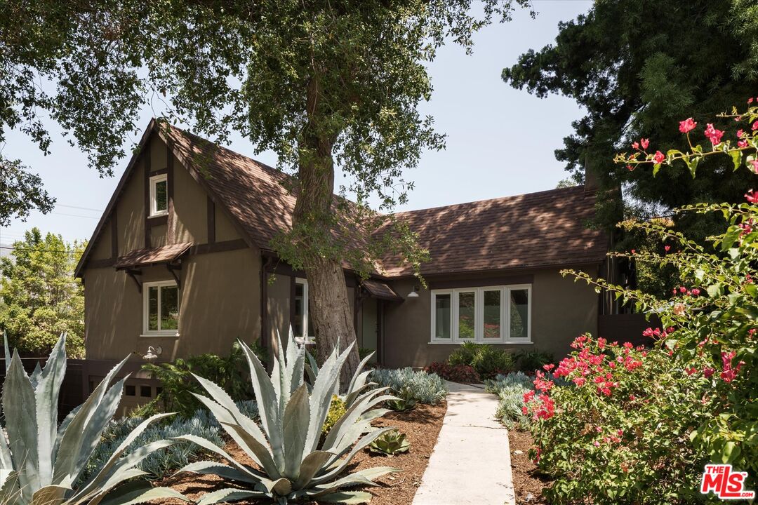 1767 Hillside Drive Glendale, CA 91208 - Photo 2 of 51 a front view of a house with a tree