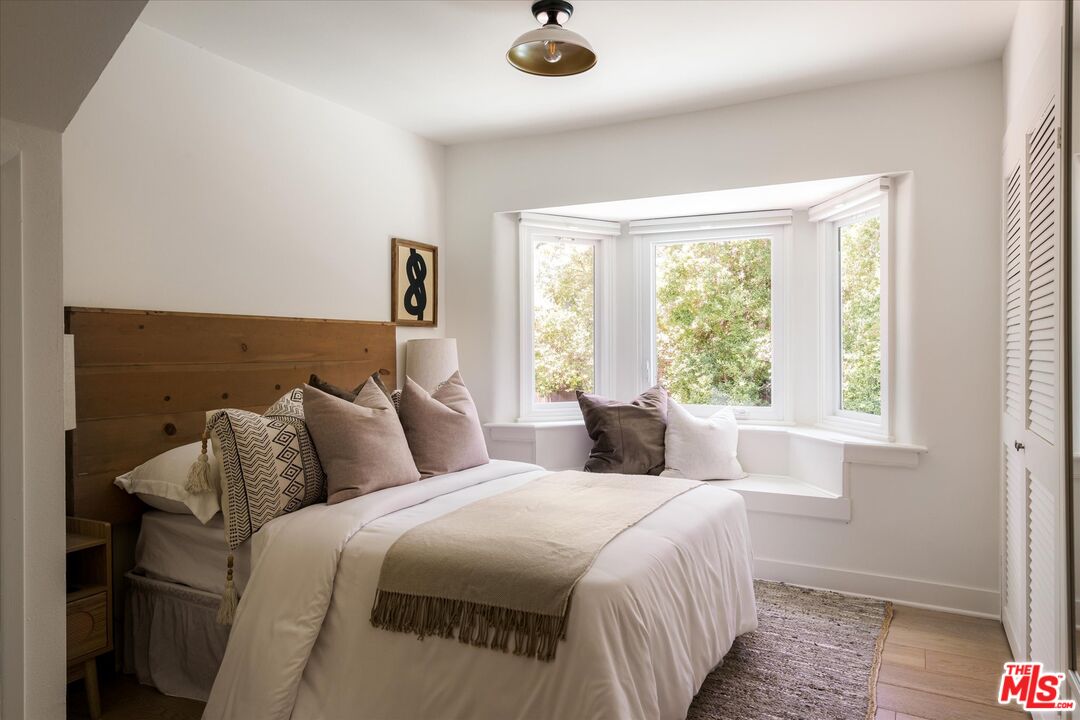 1767 Hillside Drive Glendale, CA 91208 - Photo 22 of 51 a bedroom with bed and window