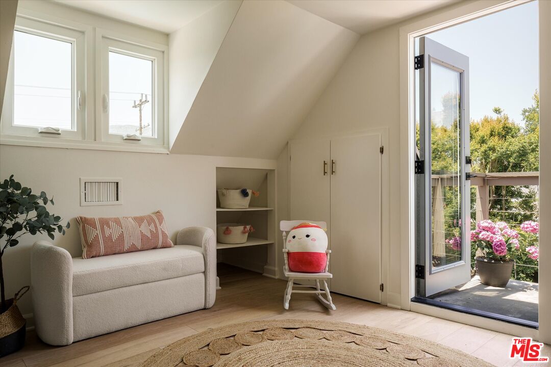 1767 Hillside Drive Glendale, CA 91208 - Photo 26 of 51 a living room with furniture and a potted plant