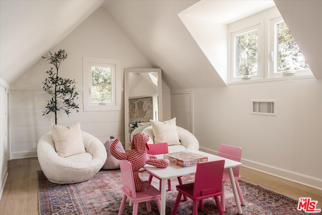 1767 Hillside Drive Glendale, CA 91208 - Photo 30 of 51 a living room with furniture and a potted plant