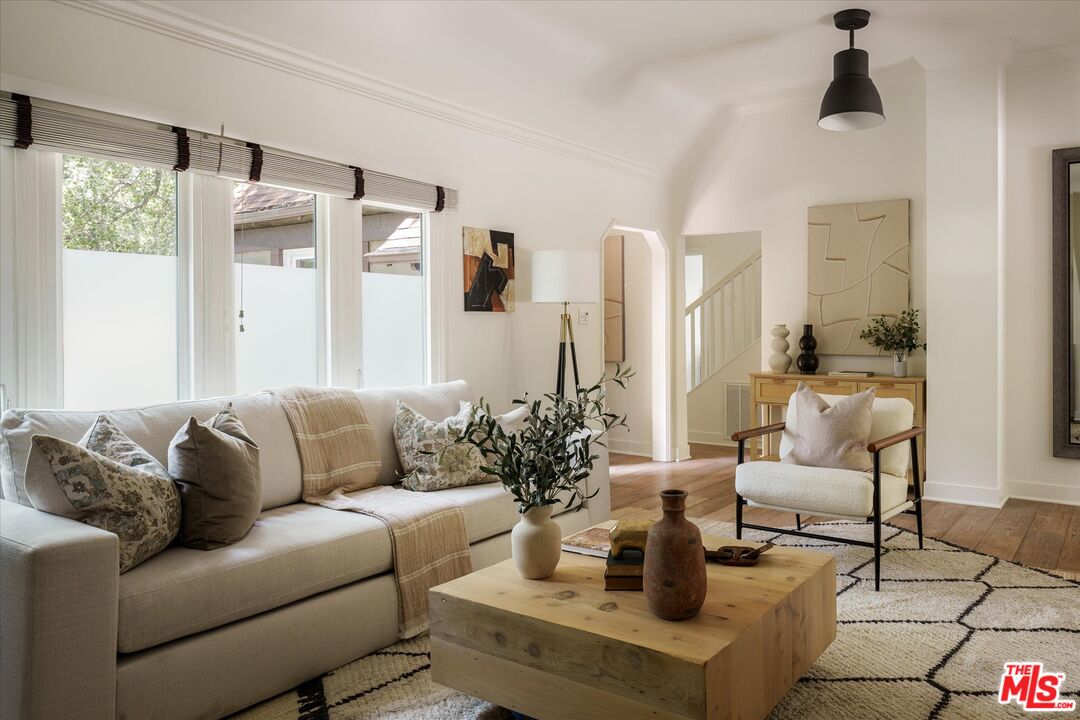 1767 Hillside Drive Glendale, CA 91208 - Photo 6 of 51 a living room with furniture and a large window