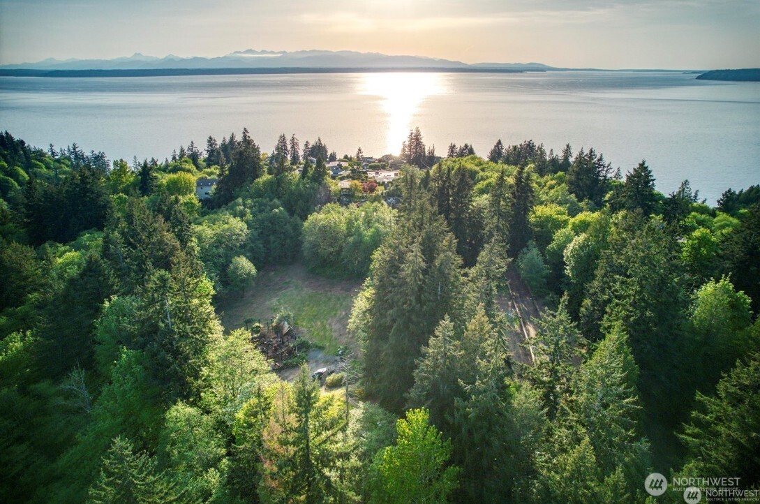 6920 Fisher Road Edmonds, WA 98026 - Photo 1 of 9 a view of a lake from a yard