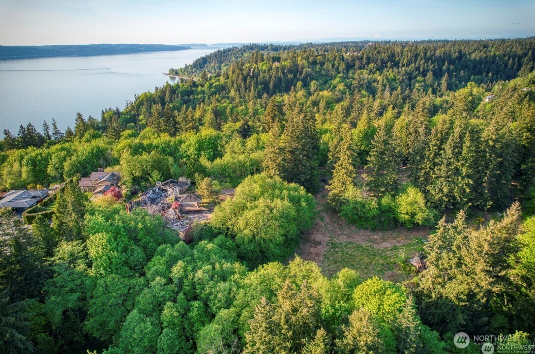 6920 Fisher Road Edmonds, WA 98026 - Photo 7 of 9 a view of a lake with a garden
