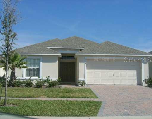 4784 Cumbrian Lakes Drive Kissimmee, FL 34746 - Photo 1 of 1 a front view of a house with a yard