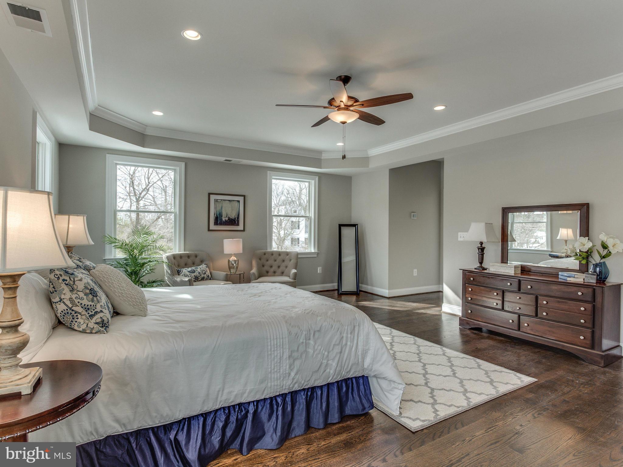 3100 North Rochester Street Arlington, VA 22213 - Photo 20 of 30 a spacious bedroom with a large bed and furniture
