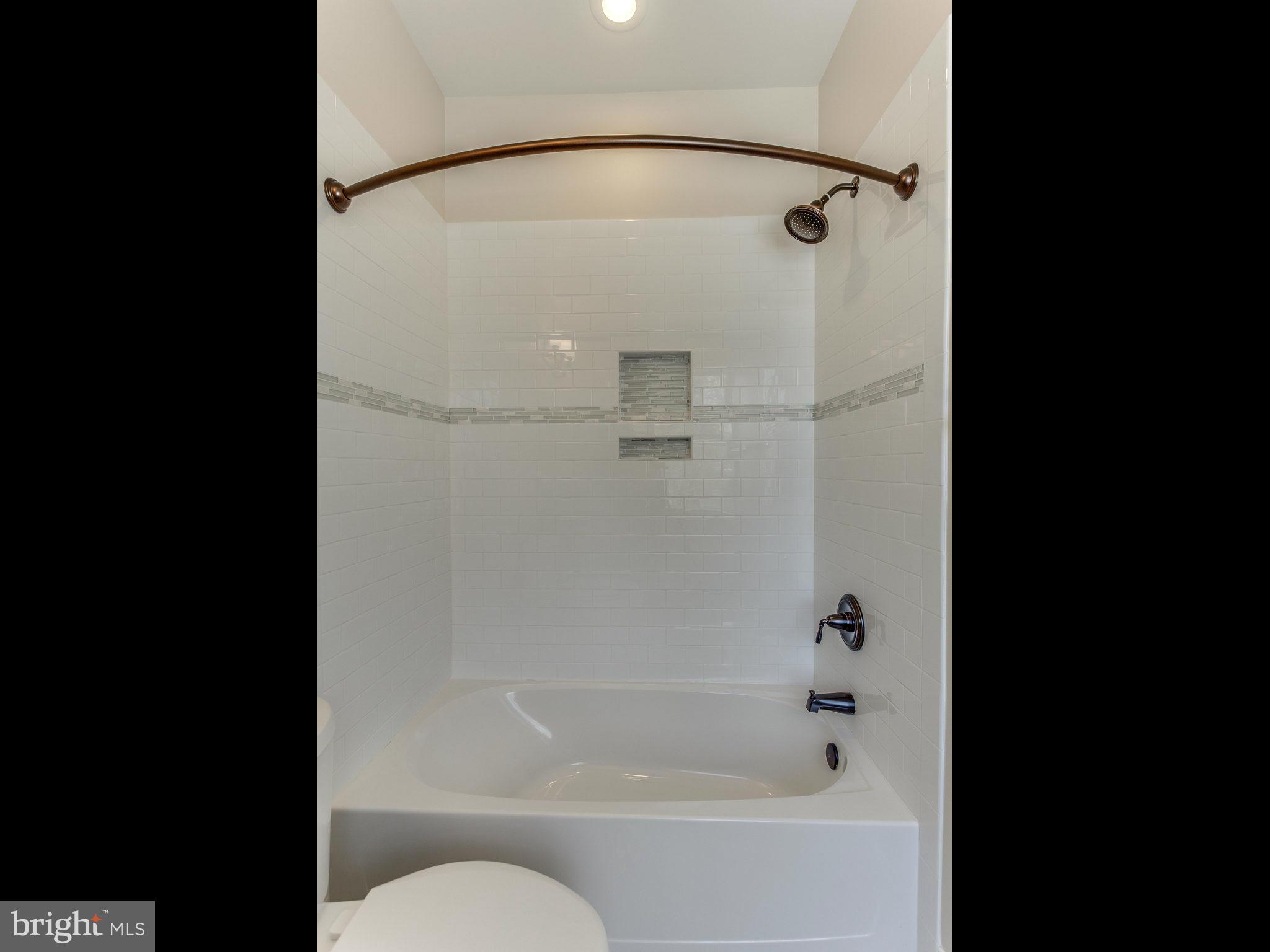 3100 North Rochester Street Arlington, VA 22213 - Photo 27 of 30 a bathroom with a shower