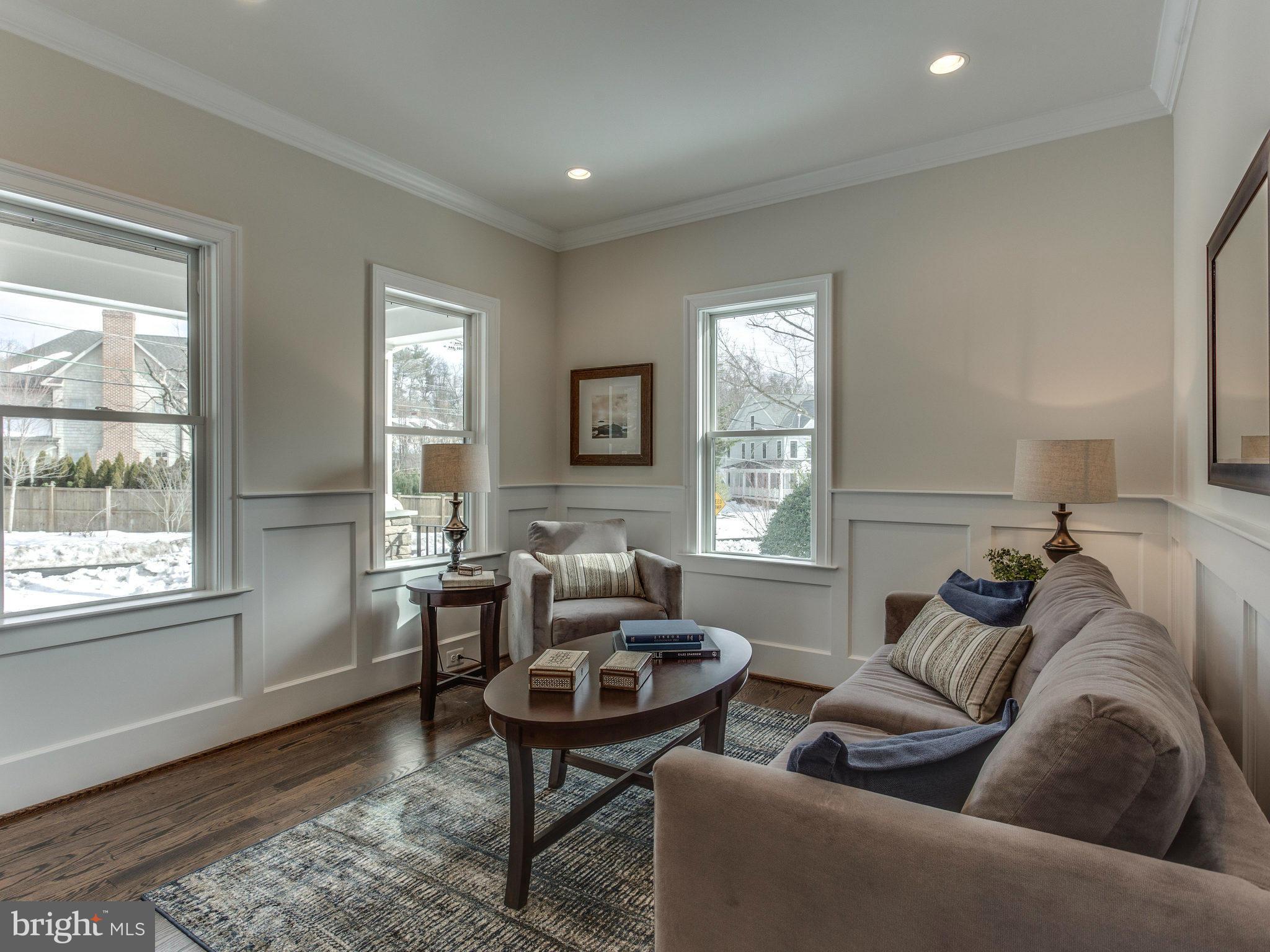 3100 North Rochester Street Arlington, VA 22213 - Photo 7 of 30 a living room with furniture and a window
