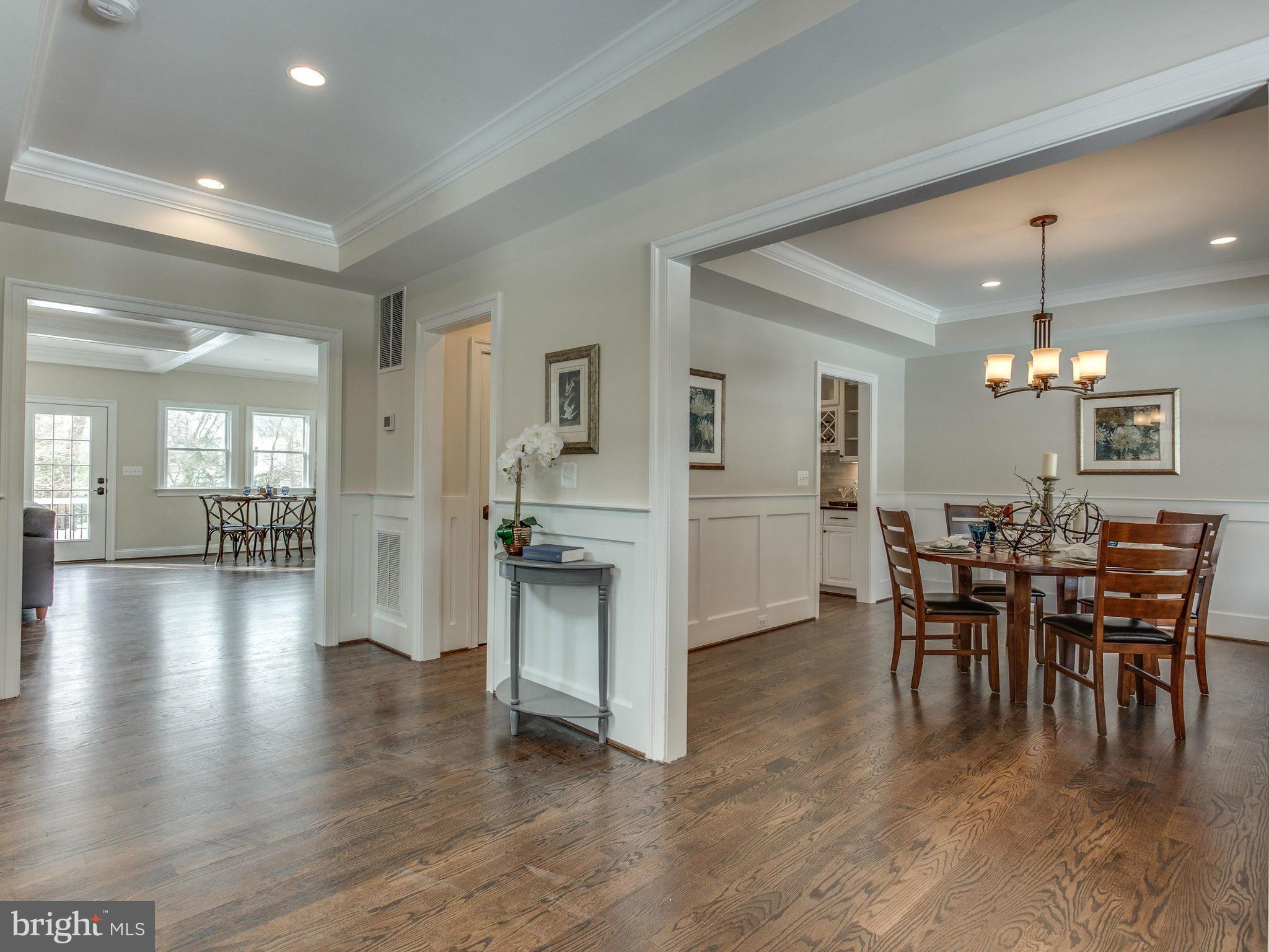 3100 North Rochester Street Arlington, VA 22213 - Photo 8 of 30 a view of a dining area with furniture and chandelier