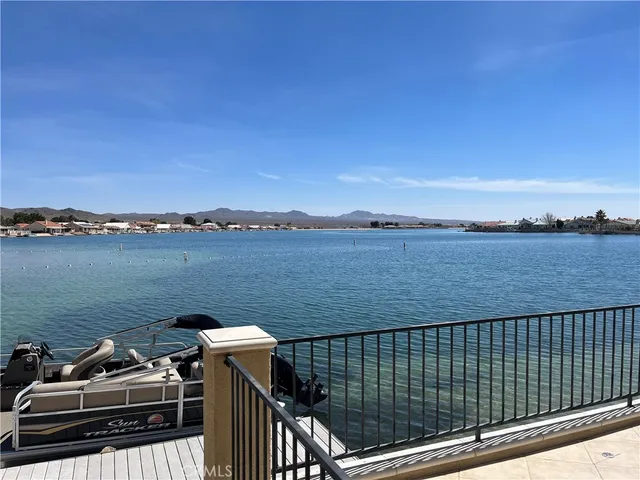 a view of a balcony with an ocean view