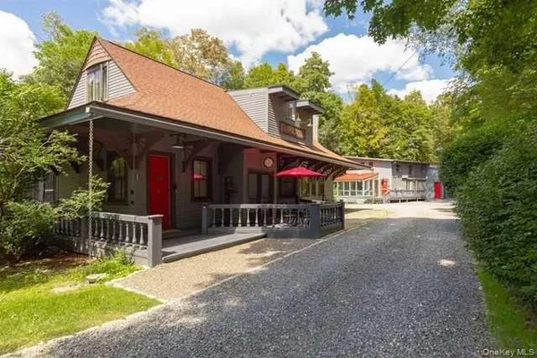 a front view of a house with a patio
