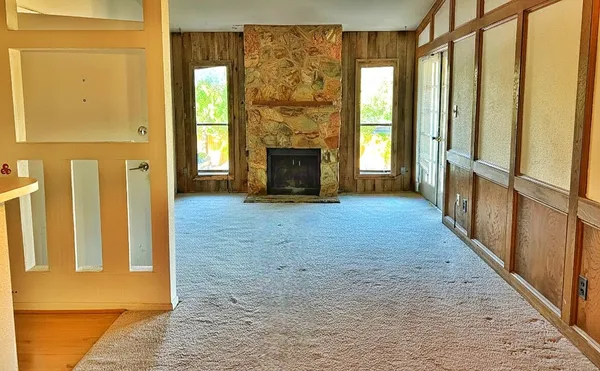 a view of an entryway with a fireplace