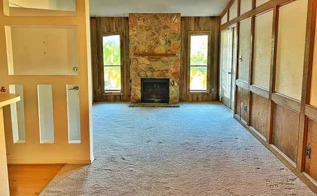 a view of an entryway with a fireplace