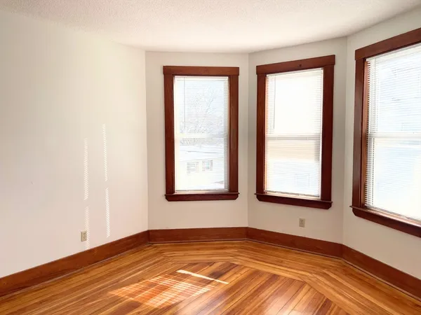 an empty room with window