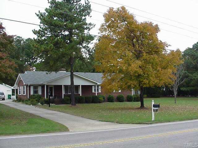 11509 Six Forks Road Raleigh, NC 27614 - Photo 1 of 1 a front view of a house with a yard