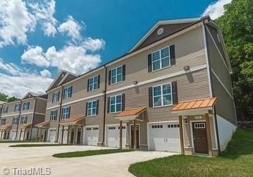 619 Riverside Drive Mount Airy, NC 27030 - Photo 1 of 17 Home is 2nd unit in from the right side