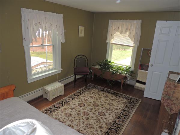 536 Snipatuit Road Rochester, MA 02770 - Photo 15 of 25 a living room with furniture and a window
