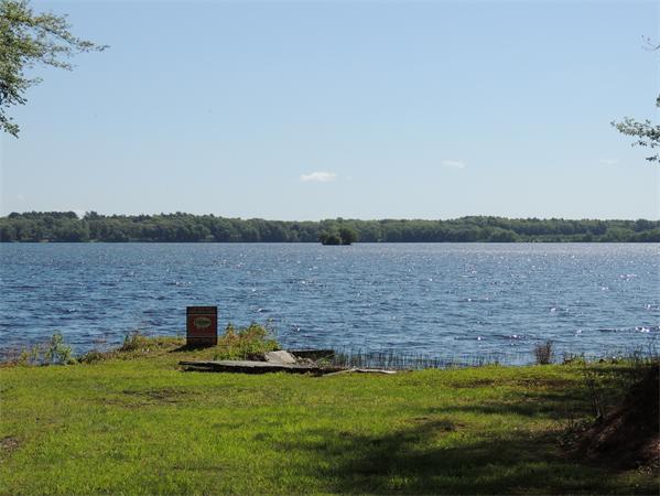 536 Snipatuit Road Rochester, MA 02770 - Photo 23 of 25 a view of a lake with houses in background