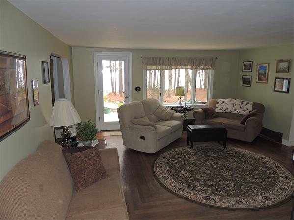 536 Snipatuit Road Rochester, MA 02770 - Photo 8 of 25 a living room with furniture and a large window