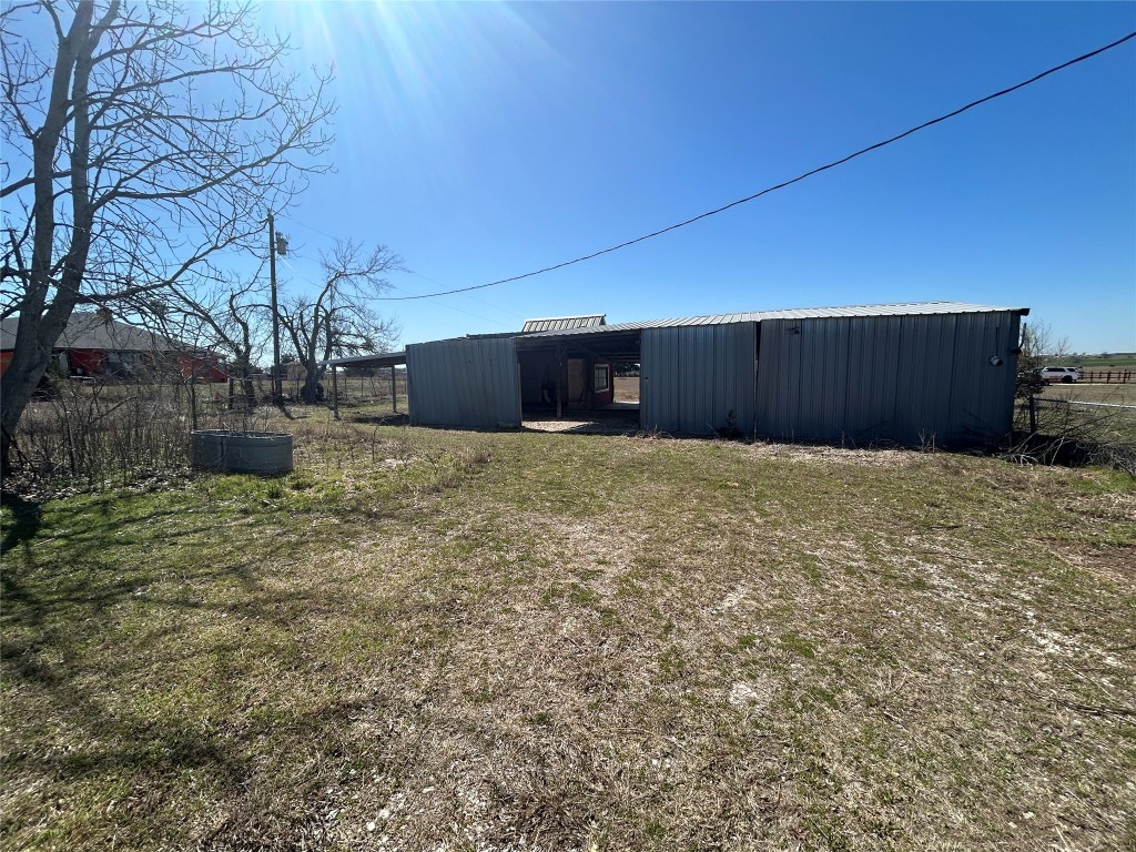 20406 Wilson Road, Unit B Coupland, TX 78615 - Photo 13 of 14 a view of a backyard