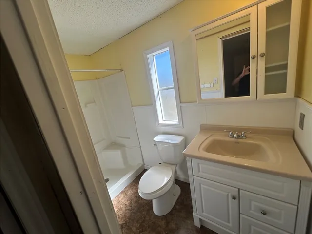 a bathroom with a sink and a toilet