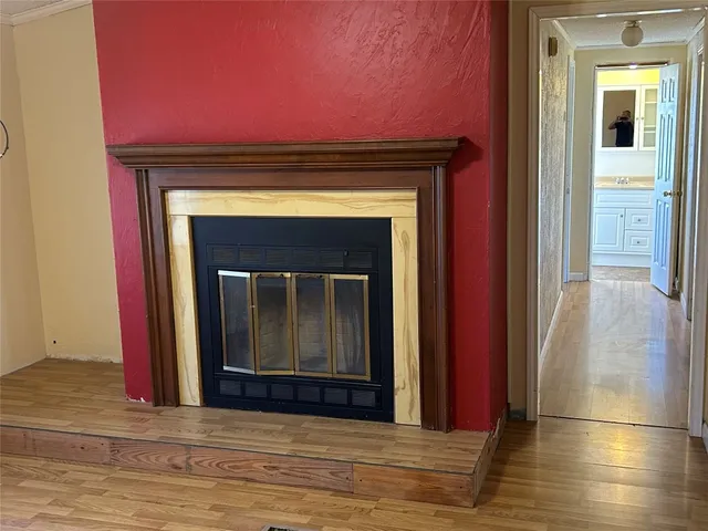 a view of a livingroom with a fireplace