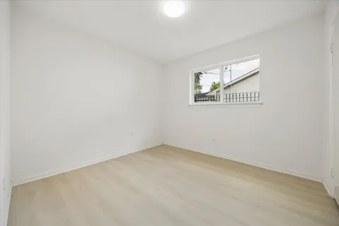 an empty room with a bench
