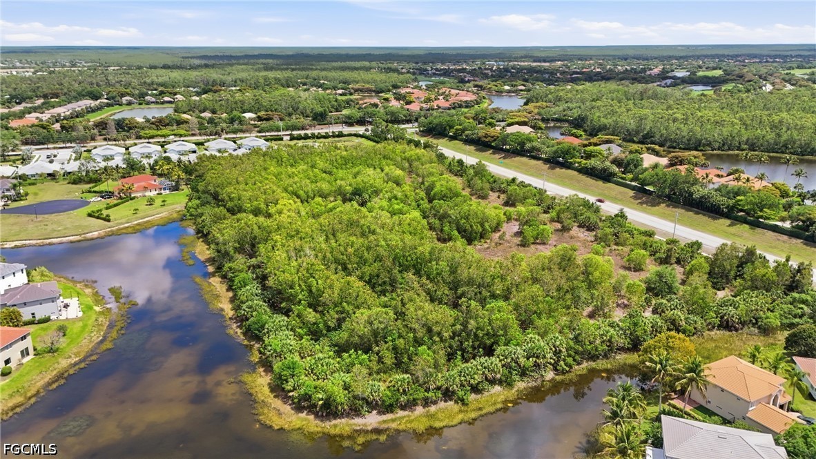 Williams Road Estero, FL 34135 - Photo 15 of 16 an aerial view of a city with lots of residential buildings