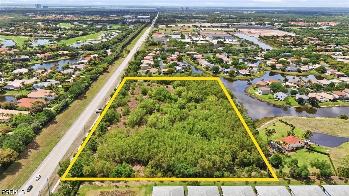 Williams Road Estero, FL 34135 - Photo 6 of 16 an aerial view of residential houses with yard