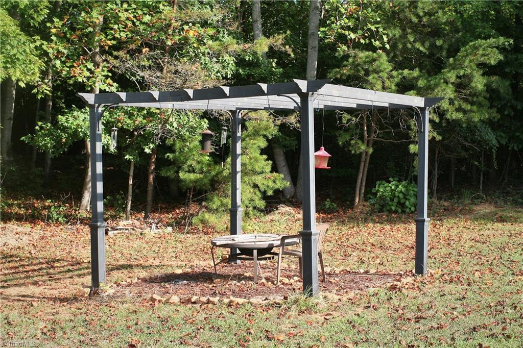 8275 Coldwater Road Stokesdale, NC 27357 - Photo 28 of 30 Portable Pergola with Firepit Area