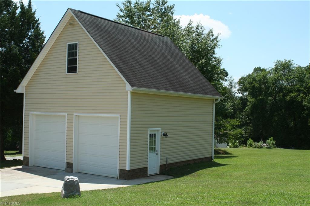 8275 Coldwater Road Stokesdale, NC 27357 - Photo 29 of 30 Detached Two Car Garage in addition to Attached Two Car Garage. Unfinished Bonus Above with Permanent Stairs.