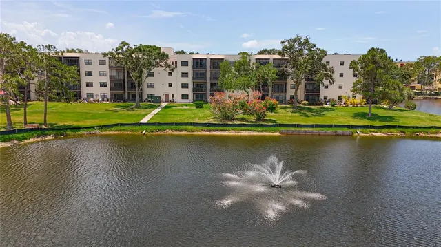 a view of a lake with a building in the background
