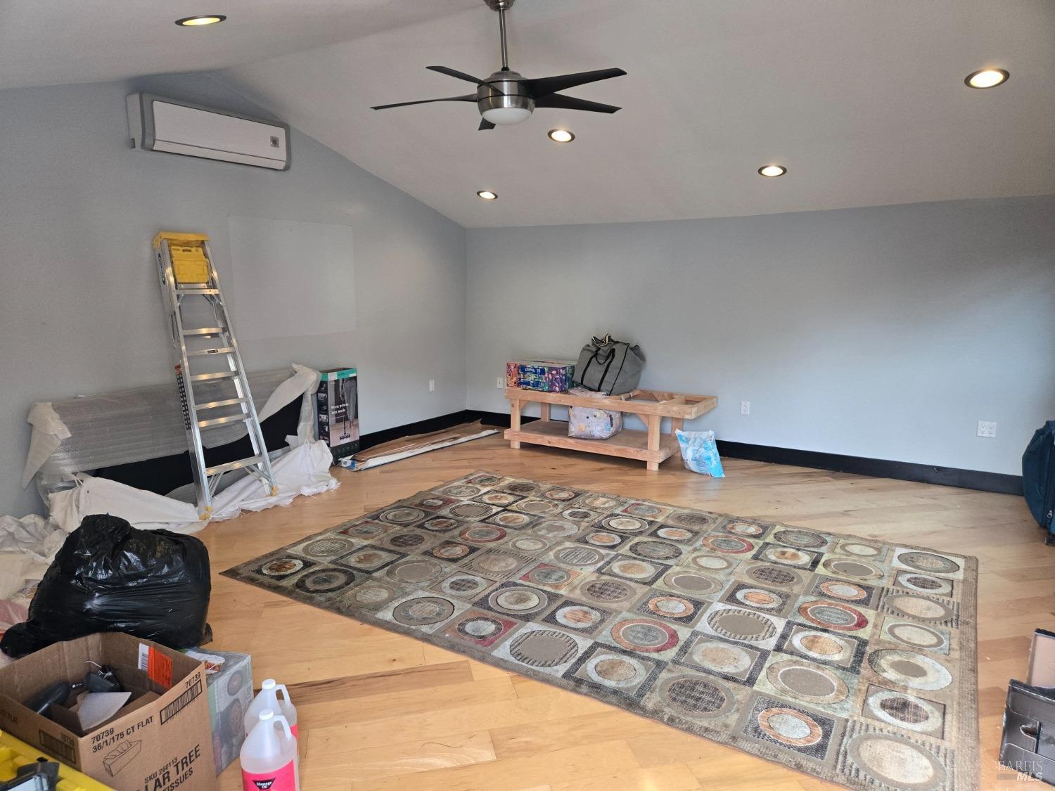 1510 4th Street Santa Rosa, CA 95404 - Photo 14 of 15 a room with furniture and a rug